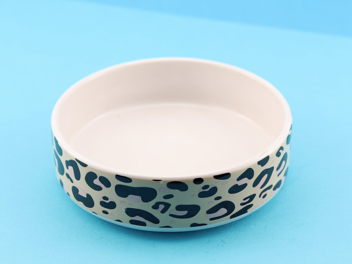 Ceramic leopard print bowl. 23cm in diameter. 